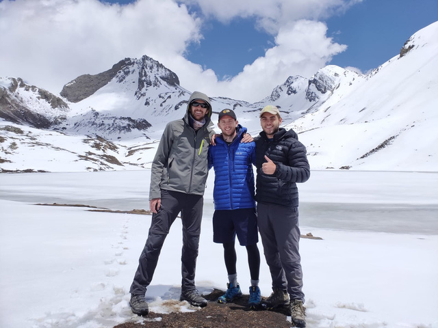 Trekkers at the frozen Ice Lake above Manang