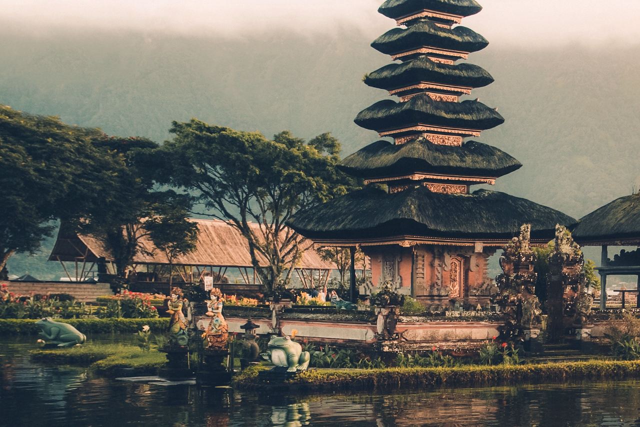 Pura Ulun Danu Beratan temple shrouded in morning mist beside Lake Beratan, Bali