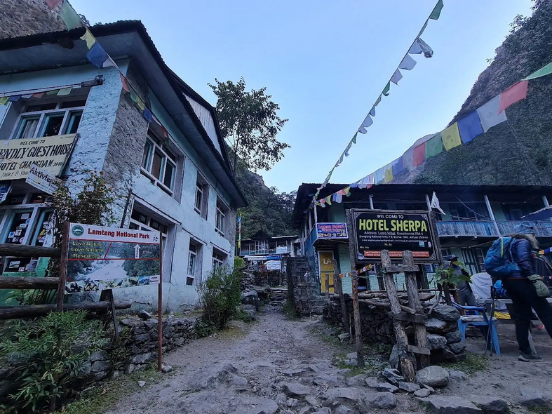 Teahouses strung with prayer flags at Lama Hotel